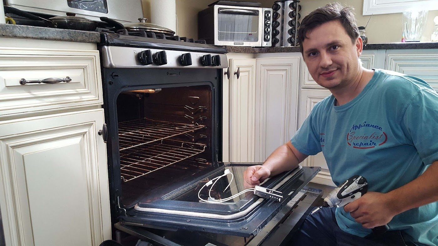 Northern Appliance Service technician repairing an oven